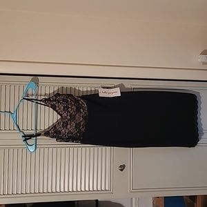 Black and tan lace trimmed cocktail dress